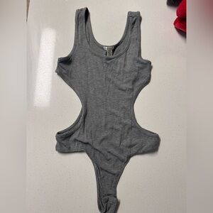 Women’s large gray bodysuit with open sides